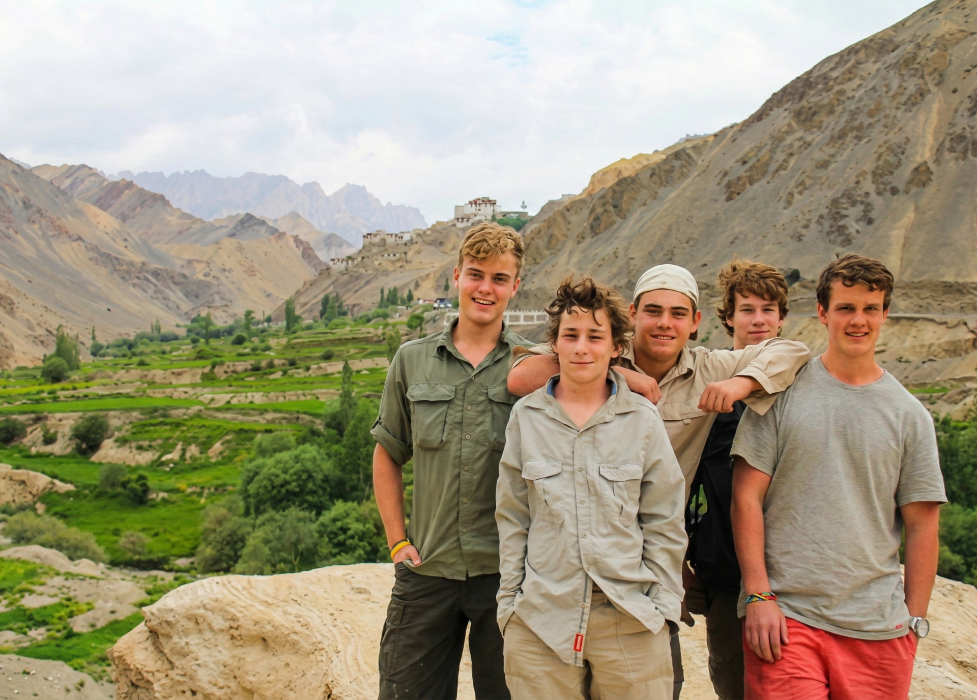 Group of students hiking through the Himalayan mountains